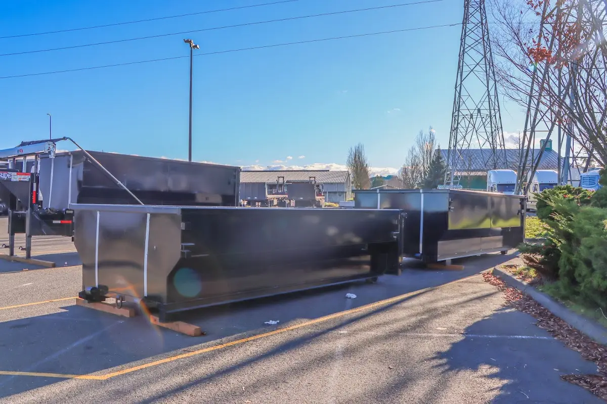 Roll-off dumpster ready for waste disposal at job site for 12 Yard Dumpster Rental in Poland